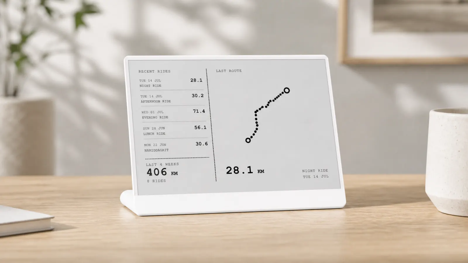 Always-on TRMNL desk display showing Activity Frame recent rides UI
